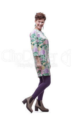 Smiling middle aged woman posing in trendy clothes