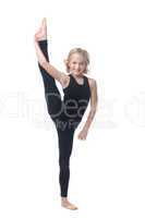 Cute little gymnast posing in vertical split
