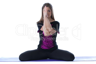 Image of meditating brunette isolated on white