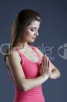 Portrait of beautiful pacified woman meditates