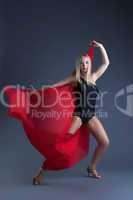 Image of emotional sexy girl dancing with cloth