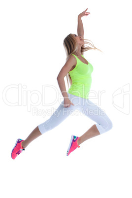 Studio shot of graceful young girl posing in jump