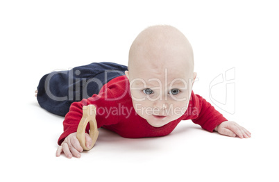 baby on floor, isolated in white background