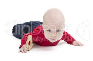 baby on floor, isolated in white background