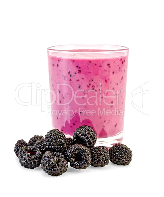 milk cocktail with blackberries in glass