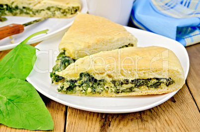pie spinach and cheese on board with knife