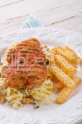 grilled chicken, cabbage salad with nuts and chips