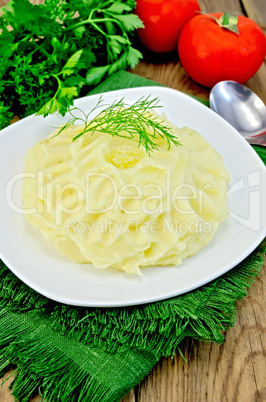 Potatoes mashed  with butter on board