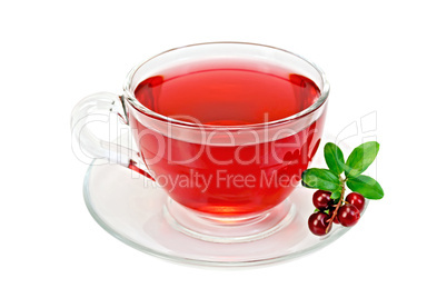 Tea with cranberries in a glass cup