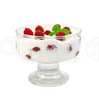 yogurt thick with raspberries in glass bowl