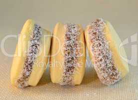 Alfajores  cookies with dulce de leche on a table