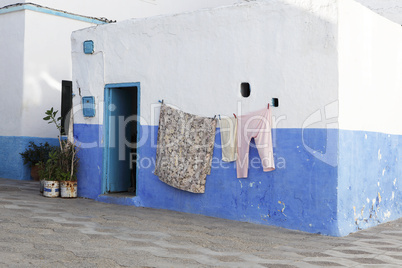 colorful laundry in assila, morocco