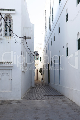 narrow alley in assila, morocco