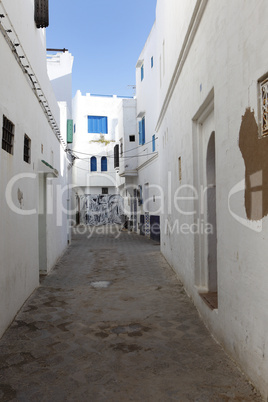 alley in assila, morocco