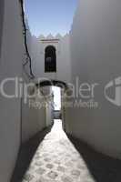 narrow alley in assila, morocco