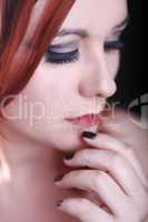 red head woman with black nails