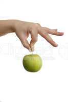 Female hand holding a green apple