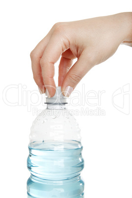 woman opens a water bottle