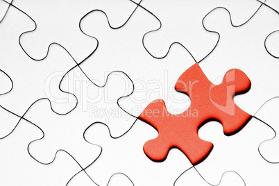 Red puzzle piece