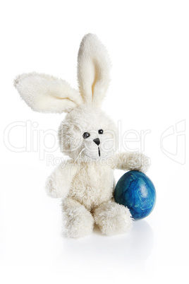 Stuffed easter bunny with blue egg