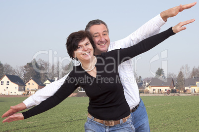 man and woman bubbling over joie de vivre