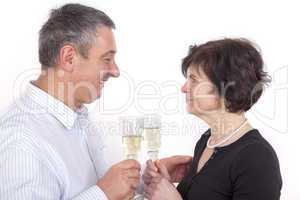 man and woman celebrating with champagne