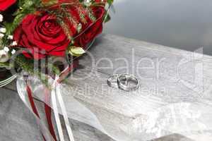 Rose bouquet with wedding rings