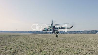 Soldier goes from Helicopter takeoff.