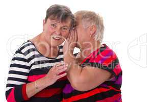 Zwei Seniorinen tuscheln