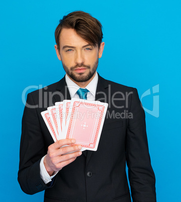 young business man showing playing cards