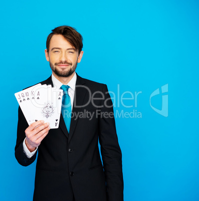 young business man showing playing cards