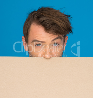 businessman holding blank poster