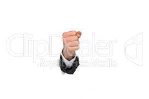 businessman hand fist breaking through paper wall