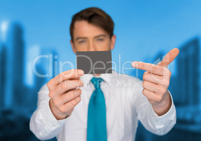 businessman holding blank businesscard