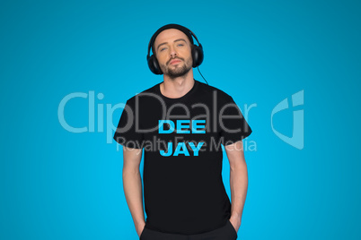 man dj wearing headphones on blue