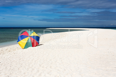 sunshade on tropical white beach