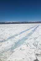 Winter ice road through Baikal