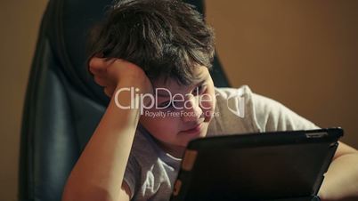 Boy using touchpad