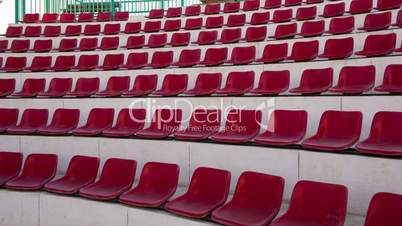Empty red seats in amphitheater
