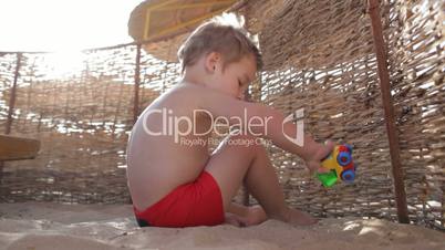 Child playing on the beach