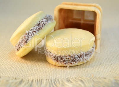 Alfajores  cookies with dulce de leche on a table