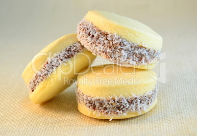 Alfajores  cookies with dulce de leche on a table