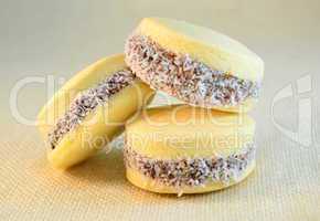 Alfajores  cookies with dulce de leche on a table