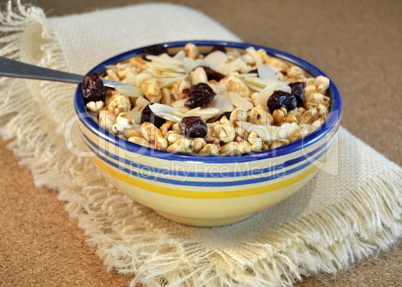 Cereals with nuts and almonds in a bowl