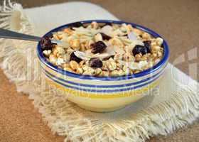 Cereals with nuts and almonds in a bowl
