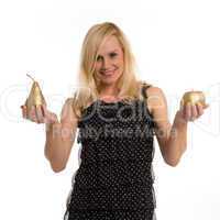 beautiful woman holding golden fruit in her hands