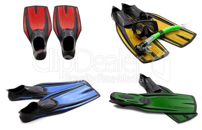 set of multicolored swim fins, mask, snorkel for diving with wat