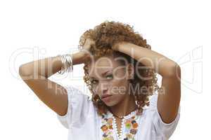 beautiful woman with her hands in curly hair
