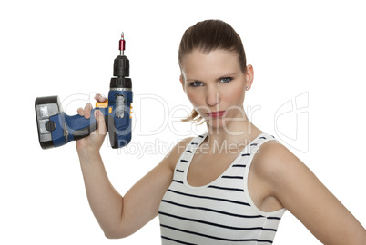 young craftswoman with a power drill