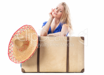 Mädchen mit Sombrero und Koffer